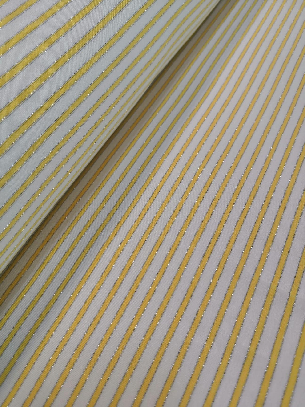 úplet žlutobílý proužek s lurexem