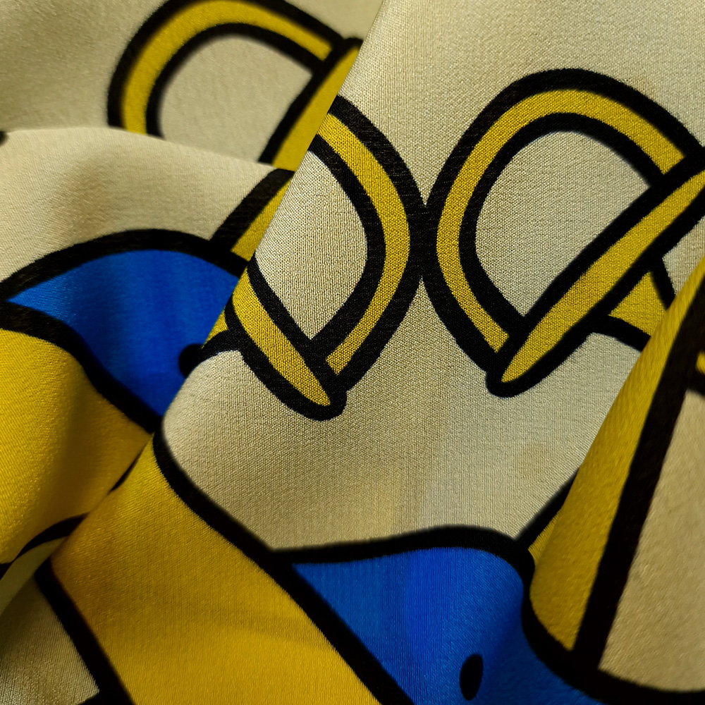 hedvábný crepe de chine, žlutomodrý vzor